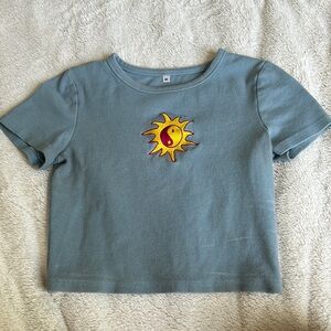 Women’s blue cropped top